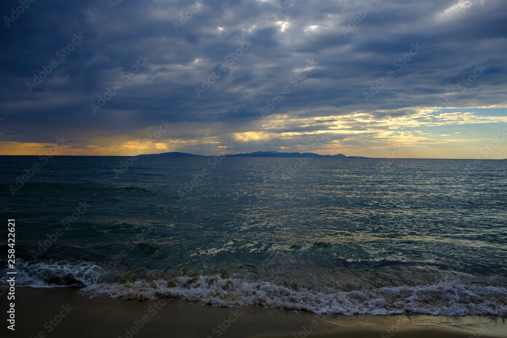 Italy, Tuscany, Castiglione della Pescaia, Punta Ala, thunderclouds at sunset Italy, Tuscany, Castiglione della Pescaia, Punta Ala, thunderclouds at sunset