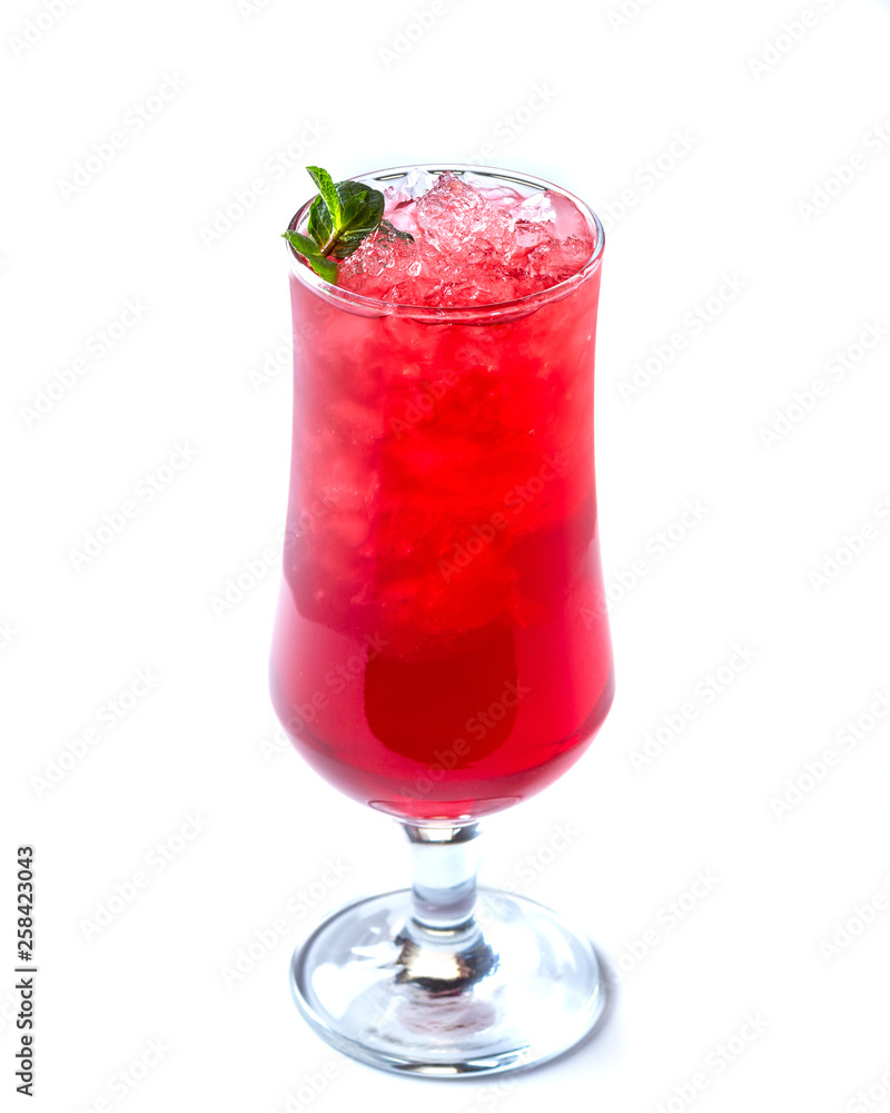 Red cocktail with ice in a tall glass decorated with mint on an isolated white background Red cocktail with ice in a tall glass decorated with mint on an isolated white background