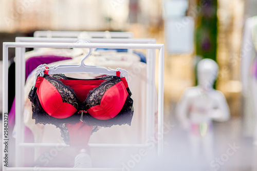 Vareity of bra hanging in lingerie underwear store. Advertise, Sale, Fashion concept photo