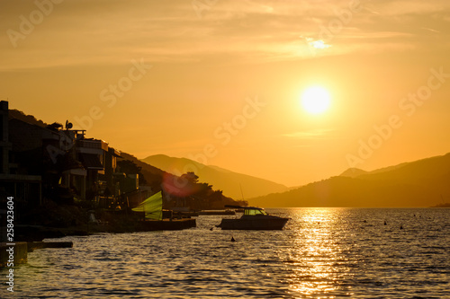 Montenegro, Bay of Kotor, Peninsula Lustica, Krasici, Lovcen mountain at sunset photo