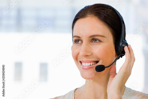 Fotografie Female call center operator