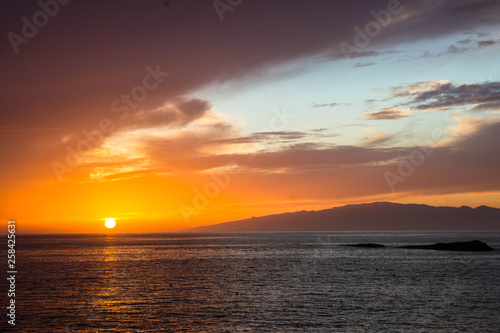 Fototapeta Naklejka Na Ścianę i Meble -  beautiful sunset over the Atlantic ocean at Costa Adaje, Tenerife Island, Spain