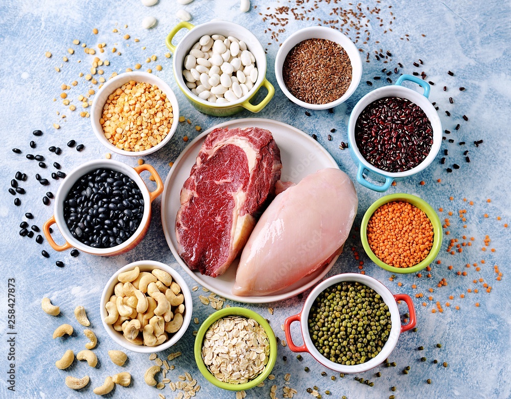 Red lentils, peas, black, white and red beans, nuts - the concept of healthy vegetarian food. Top view. Red lentils, peas, black, white and red beans, nuts - the concept of healthy vegetarian food. Top view.