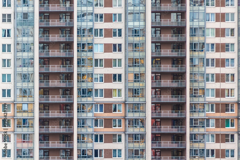 windows and balconies of a multistory apartment building