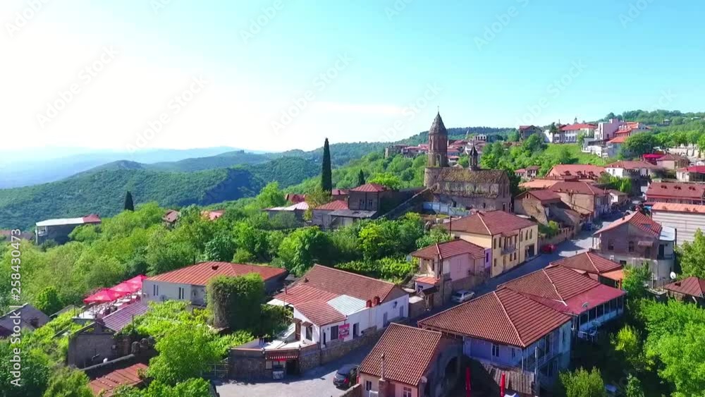 Aerial view to Sighnaghi city - georgian town Signagi in Georgia's easternmost region of Kakheti. Important center of Georgia's tourist industry. Alazani valley in Georgia Aerial view to Sighnaghi city - georgian town Signagi in Georgia's easternmost region of Kakheti. Important center of Georgia's tourist industry. Alazani valley in Georgia