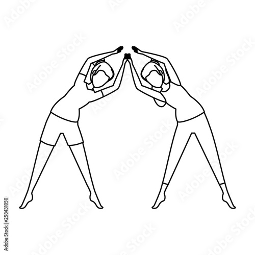 group of women practicing yoga position