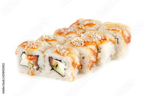 Sushi Roll - Maki Sushi made of Smoked Eel, Salmon, Sesame, Cream Cheese and Deep Fried Vegetables inside, isolated on white background