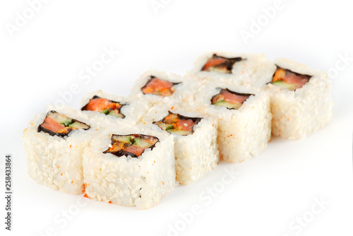 Sushi Roll - Maki Sushi made of Smoked Eel, Cream Cheese, Sesame, Salmon and Deep Fried Vegetables inside, isolated on white background
