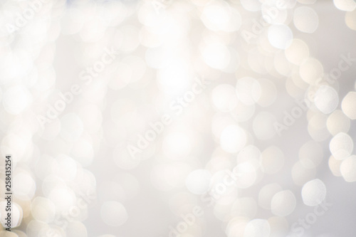 classy upscale high end, white silver, christmas holiday backdrop blurry lights. festive beautiful  photo