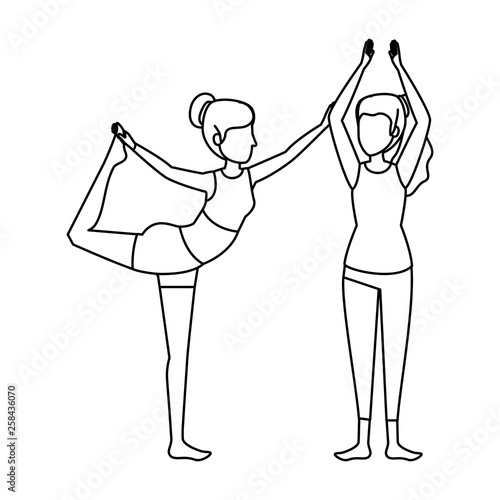 group of women practicing yoga position