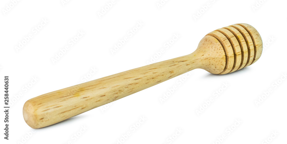 A wooden honey dipper isolated on white background with clipping path A wooden honey dipper isolated on white background with clipping path