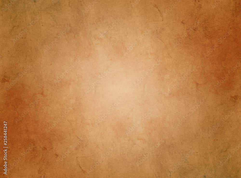 Obraz premium An elegant, brown, tan, grunge parchment texture background with glowing center and copy space for text. 
