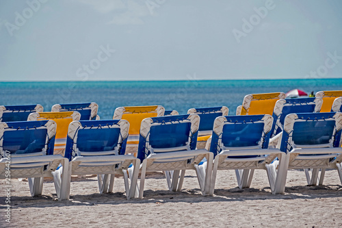 Colorful beach chairs and buildings of Key West.
