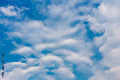 white fluffy clouds in the blue sky