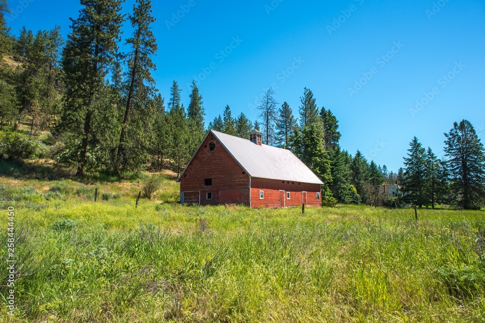 old log cabin on ranch in the mountains