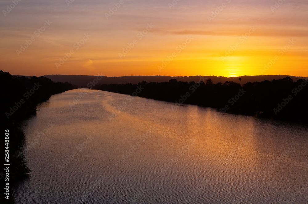 Sun sets behind the Blue Mountains, view along Nepean River Sun sets behind the Blue Mountains, view along Nepean River