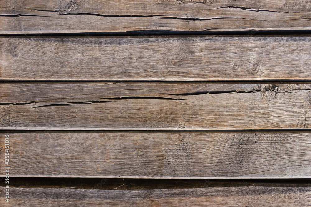 Old dark weathered wooden wall. Wooden texture background Old dark weathered wooden wall. Wooden texture background