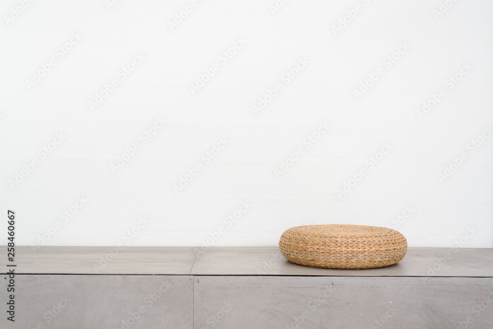 Weave sitting chair on concrete floor with white wall Weave sitting chair on concrete floor with white wall