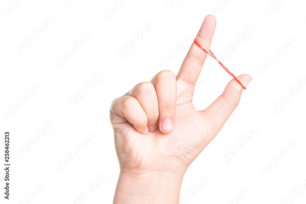 Child hand playing with elastic rubber band isolated on white Child hand playing with elastic rubber band isolated on white