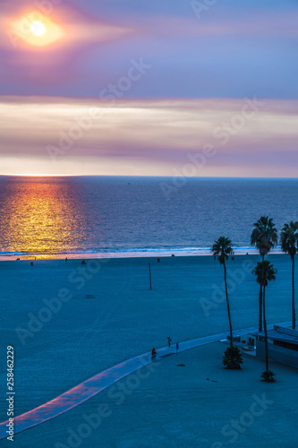 sunset at santa monica beach and pier photo