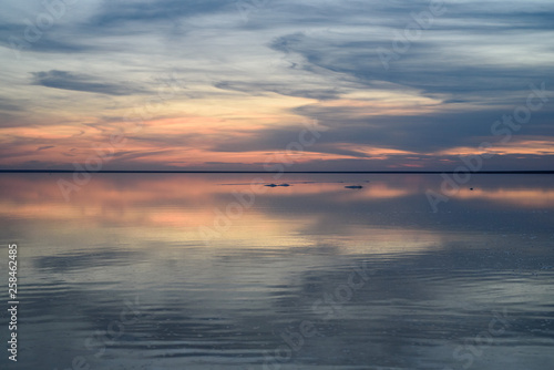 Salt lake. Evening sunset with beautiful sky and water. © Svetlana