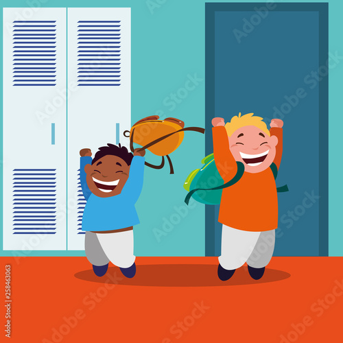 happy little interracial boys in the school corridor