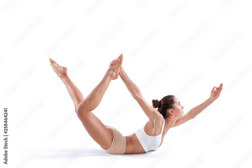 Sporty woman with good figure doing exercises isolated on white. Sporty woman with good figure doing exercises isolated on white.
