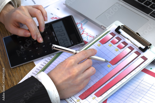 female hand with objects for doing business in the office