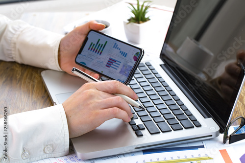 female hand with objects for doing business in the office