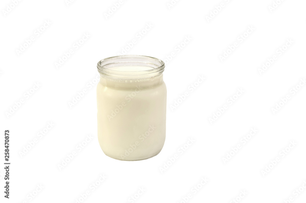 milk in a jar on a white background milk in a jar on a white background