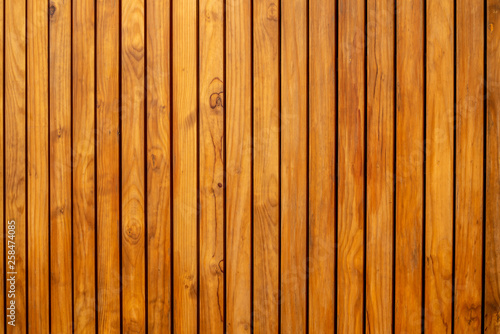 Horizontal or vertical of wood planks deck texture wallpaper background in light brown color