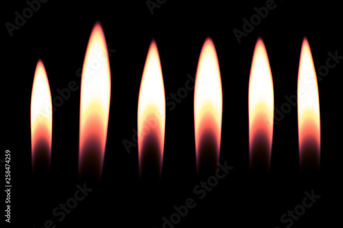 narrow flame, fire lighter on a black background 