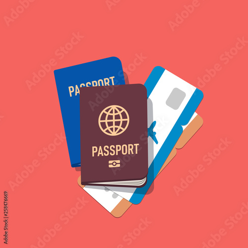 Blue and brown passport with on air ticket.