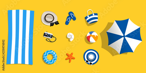 Beach accessories on sand. Set objects for swimming and vocation sea. Top view. Vector illustration in flat style.