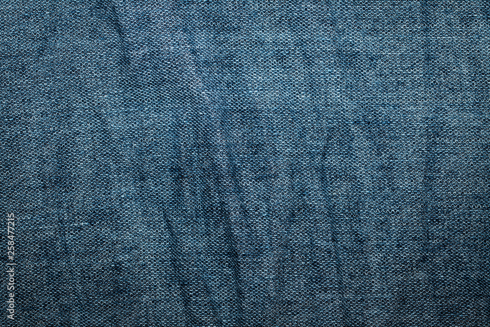 Blue denim texture, background, abstraction. Textile space for text. Blue denim texture, background, abstraction. Textile space for text.
