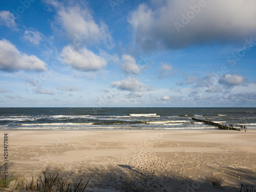 windy day by the baltice sea cloudy sky sandy beach