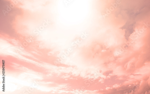 Fabulous sunset on a blue sky with white clouds. Background, texture.