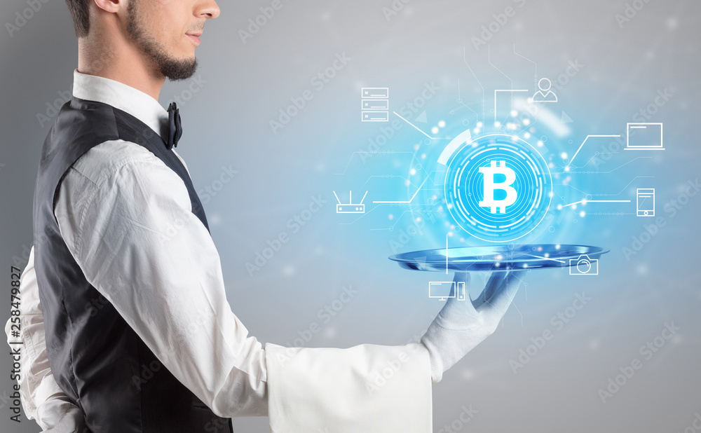 Waiter serving on a tray cryptocurrency and mining concept
Waiter serving on a tray cryptocurrency and mining concept