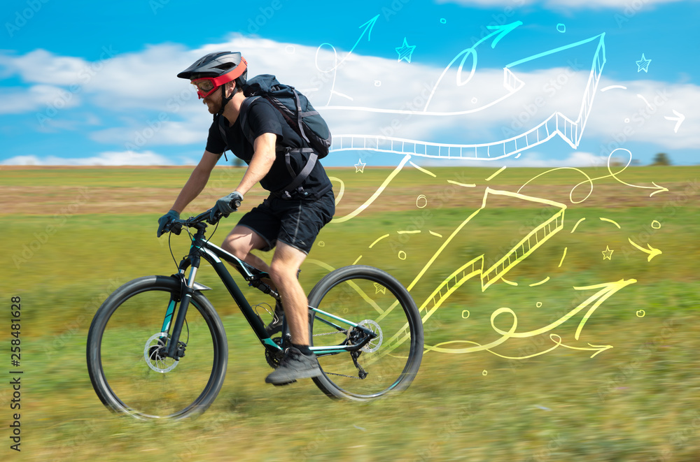 Young cyclist in casual clothing with fabulous nature background Young cyclist in casual clothing with fabulous nature background
