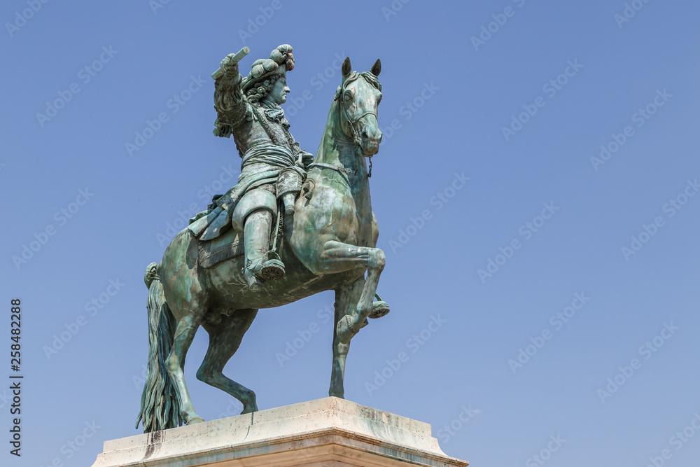 VERSAILLES / FRANCE - JULY 2015: Bronze statue of Louis XIV in Versailles, France