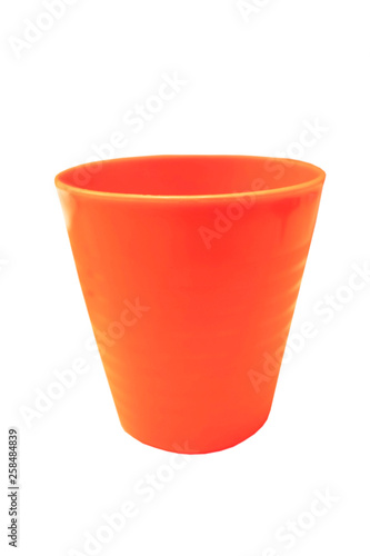 Orange plastic glass isolated on white background of file with Clipping Path .