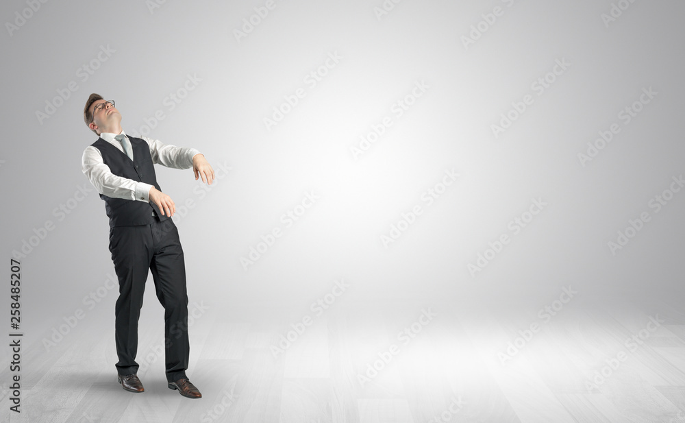 Zombi, sleepy maniac businessman walking in a copy space
Zombi, sleepy maniac businessman walking in a copy space