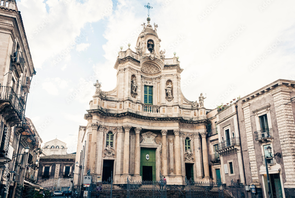 Beautiful cityscape of Italy, facade of old cathedral Catania, Sicily, Italy, Basilica della Collegiata, famouse baroque church.