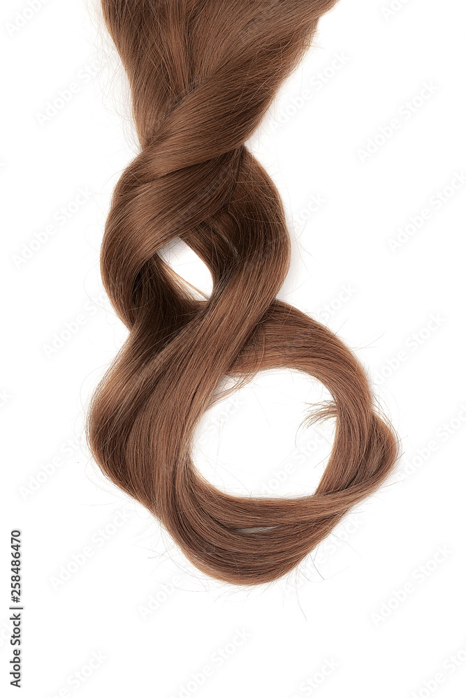 Long beautiful brown hair in shape of numeral eight, isolated on white background Long beautiful brown hair in shape of numeral eight, isolated on white background