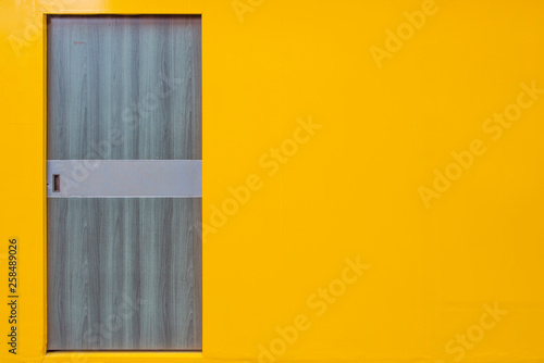 Yellow wall blue door