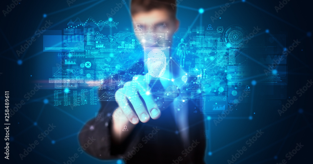 Man accessing modern hologram personal database with fingerprint identification Man accessing modern hologram personal database with fingerprint identification