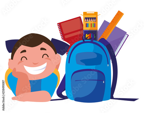 happy little schoolboy with schoolbag and supplies