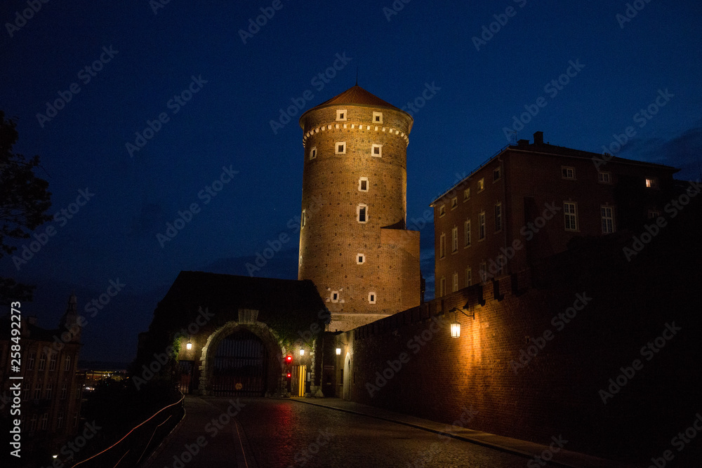 buildings in Krakow at night by the light of lanterns