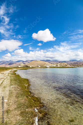 Karakul Lake along Karakorum Highway, Xinjiang, China, connecting Kashgar and the Pakistan border. 3600m, it is the highest lake in Pamir Plateau. Mt. Kongur, 7700m, is visible in the background