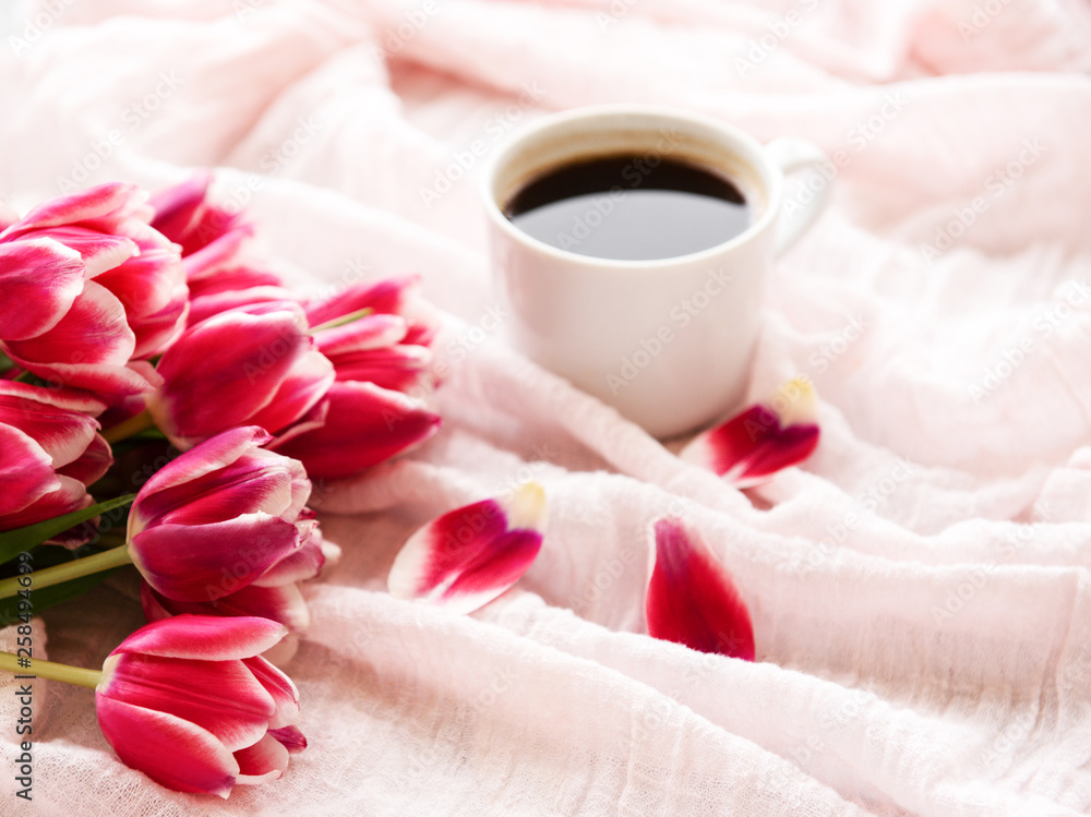 Cup of coffee and pink tulips Cup of coffee and pink tulips